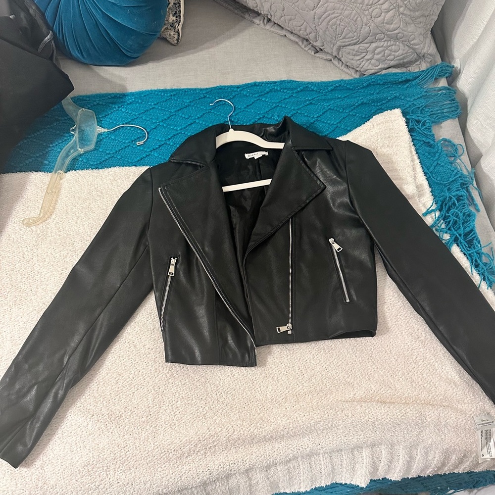 Subdued “Leather” Jacket size small. thin material and lightweight